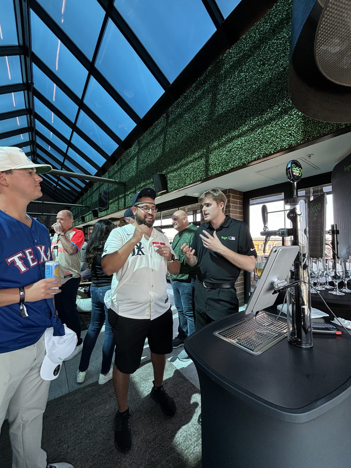 Guests watching a pour, Sage x MLB party in Fort Worth